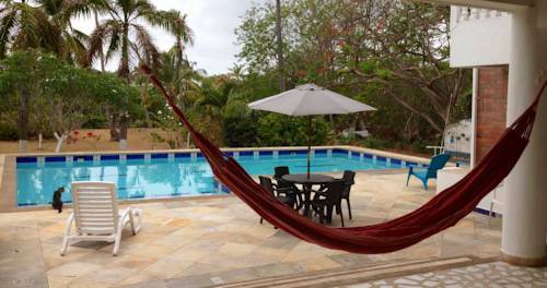 Hostal Casa De Las Flores Tropical Lodge