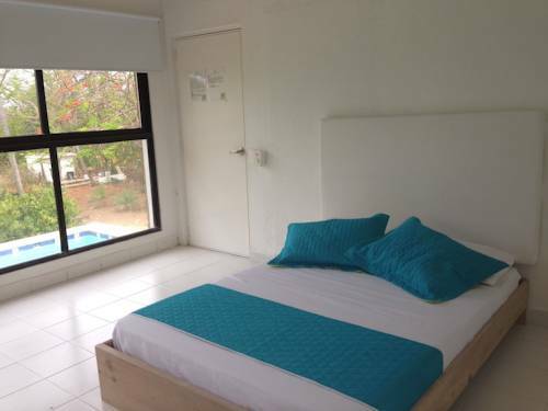 Hostal Casa De Las Flores Tropical Lodge