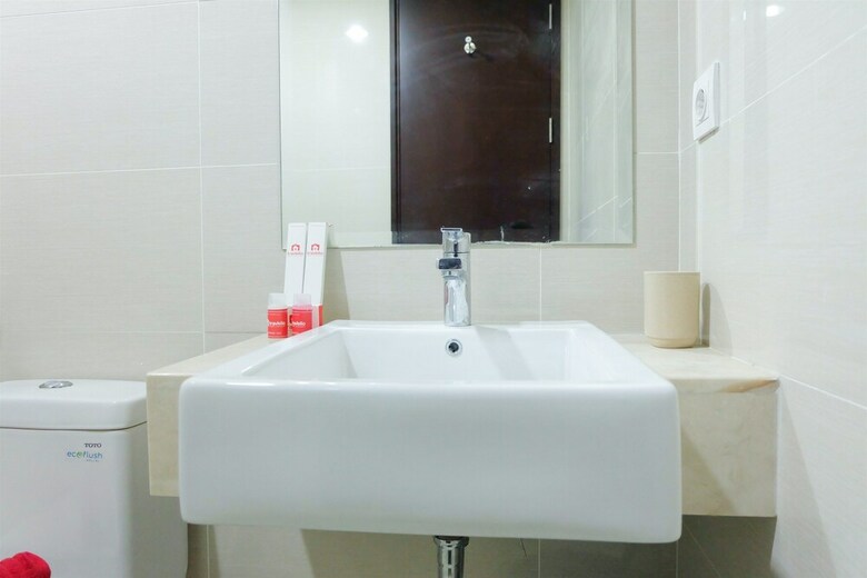 Homey And Modern 2br Puri Mansion Apartment