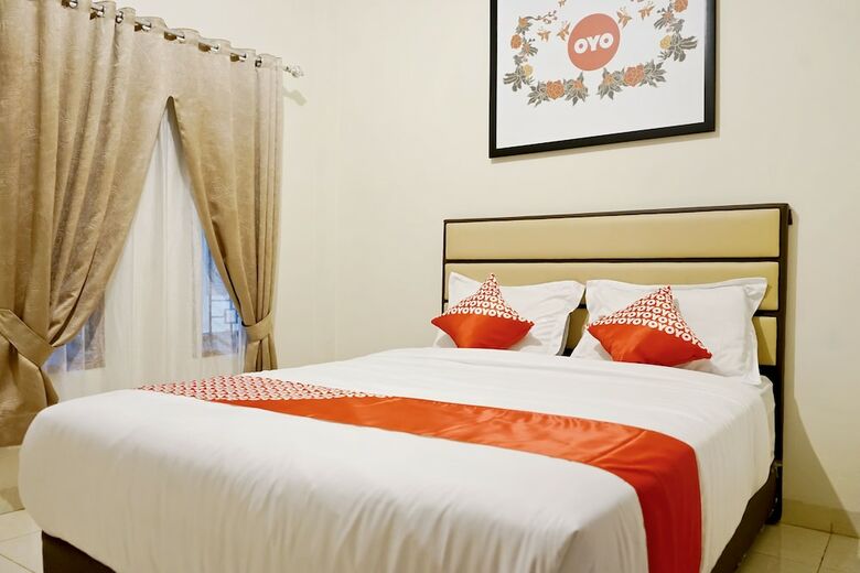 Hostal Oyo 1076 Dmc Homestay
