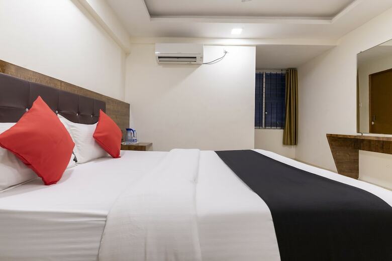 Hotel Capital O 49120 Ak International