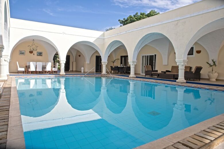 Apartamentos Mzima House Boutique Hotel