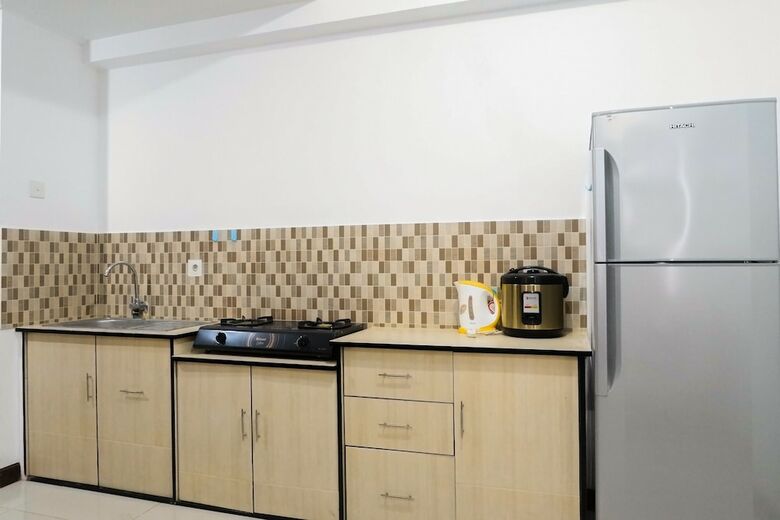 Homey And Comfy 2br Apartment At Waterplace Residence