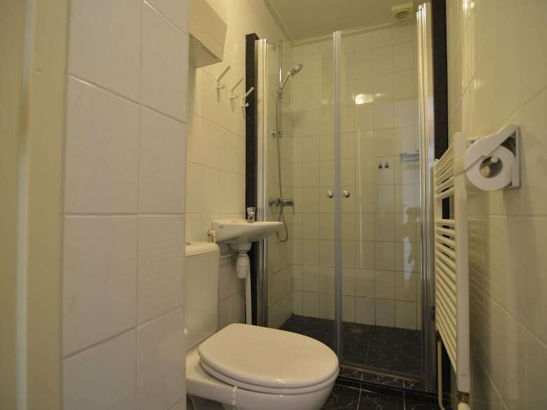 A Detached Bungalow With Outdoor Fireplace, Covered Terrace And Pond In A Forest Plot