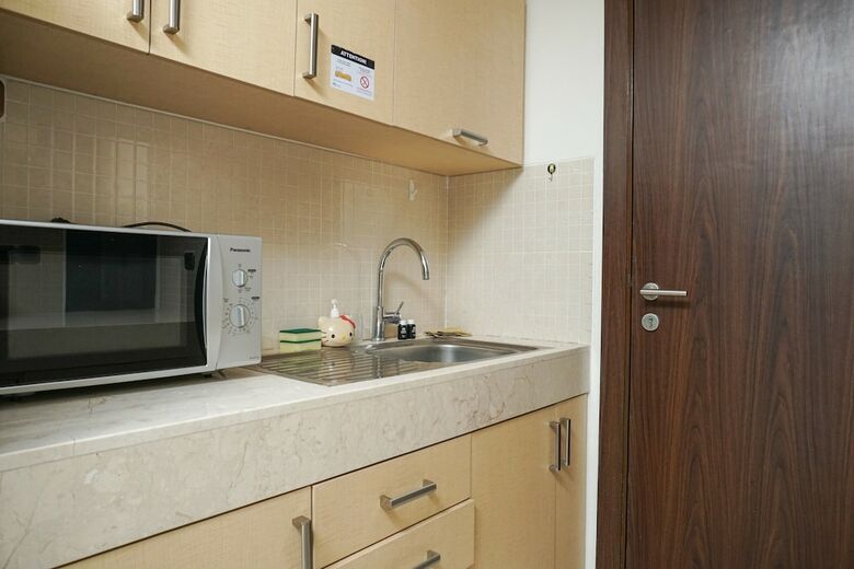 Modern 2br At St. Moritz Apartment Near Shopping Mall