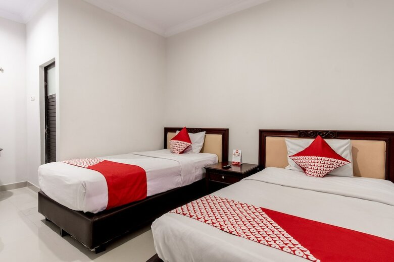Hostal Oyo 283 Helvetia Residence