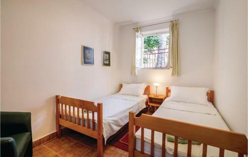 Two-bedroom Holiday Home In Njivice