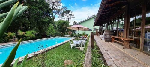 Pousadinha L� Em Casa
