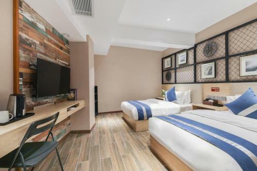 Zou Qu Ye Travel Hotel