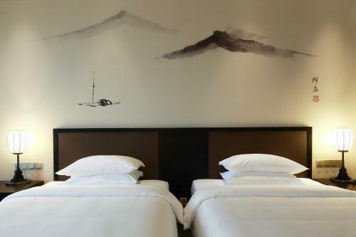 Amitabha Hotel (Fuzhou Pushang)