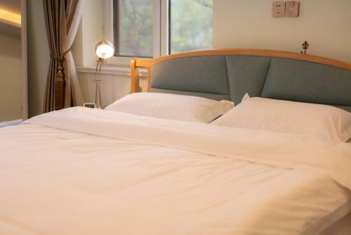 Qingdao Top Yunyin Homestay