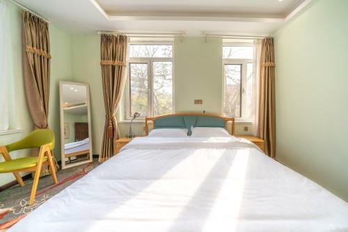 Qingdao Top Yunyin Homestay