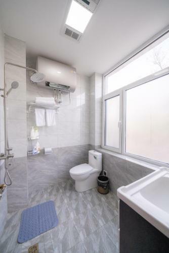 Qingdao Top Yunyin Homestay
