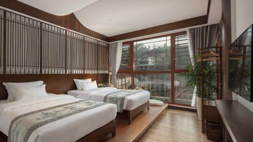 Floral Hotel Fengxue Yeguiren