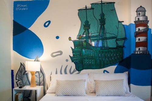 Casa Del Puerto Hostel & Suites