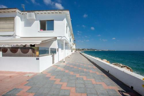 Lets In The Sun La Cala Beachside Townhouse
