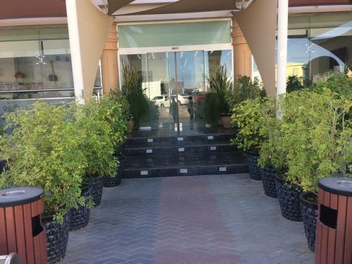 Apartamento Oman Palm Hotel Suites