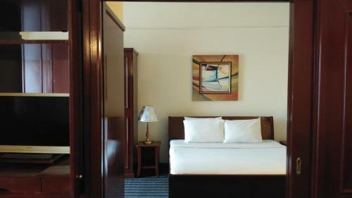 Apartamento Imbisuka Suites