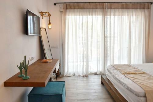 Apartamento Angelos Boutique Suites