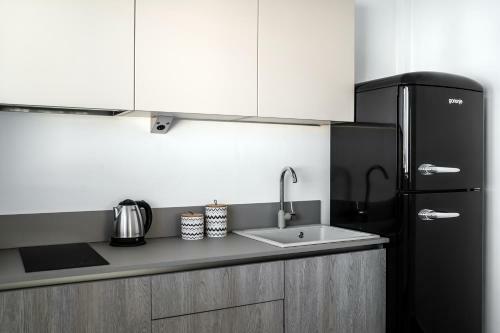Apartamento Thira Gold Suites