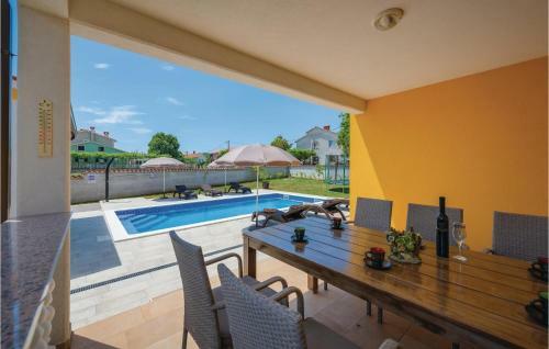 Three-bedroom Holiday Home In Labin