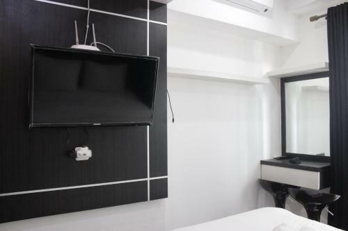 Functional Studio Room The Jarrdin Cihampelas Apartment By Travelio