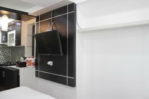 Functional Studio Room The Jarrdin Cihampelas Apartment By Travelio