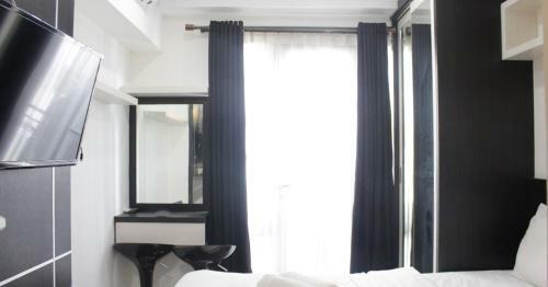 Functional Studio Room The Jarrdin Cihampelas Apartment By Travelio