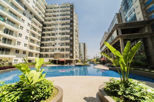 Homey 3br Apartment At Gateway Pasteur Near Exit Toll By Travelio