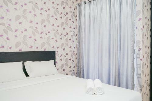 Modern Comfy 2br Serpong Greenview Apartment By Travelio