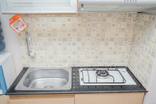 Modern Comfy 2br Serpong Greenview Apartment By Travelio