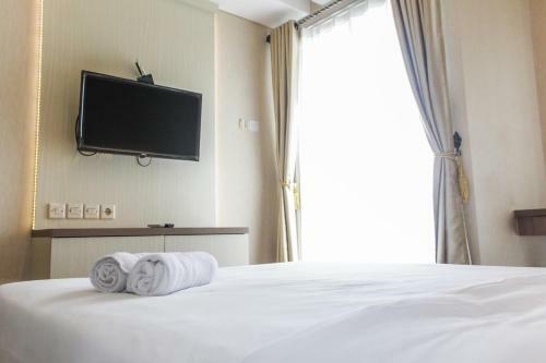Modern Studio Akasa Pure Living Apartment By Travelio