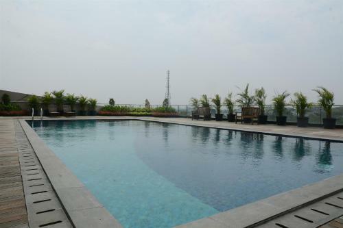 Spacious And Cozy 1br At Tree Park Apartment By Travelio