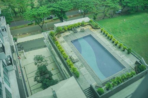 Spacious And Cozy 1br At Tree Park Apartment By Travelio