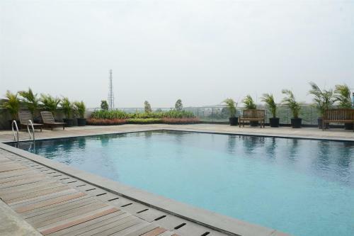 Spacious And Cozy 1br At Tree Park Apartment By Travelio