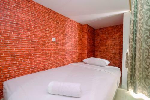 Cozy And Minimalist Studio At Dave Apartment By Travelio