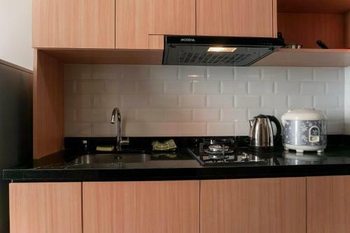 Best View Studio Apartment @ Ciputra International By Travelio