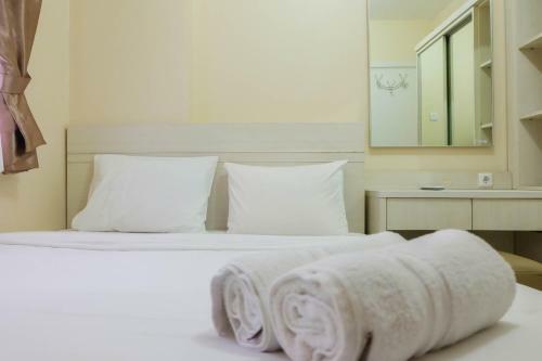 Modern And Comfy 2br Green Pramuka Apartment By Travelio