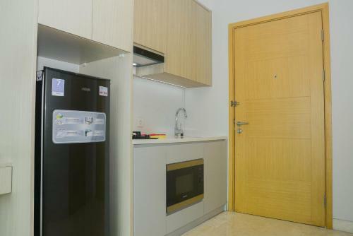 Comfortable Studio Room At Capitol Suites Apartment By Travelio