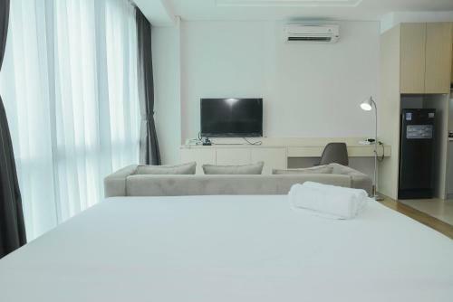 Comfortable Studio Room At Capitol Suites Apartment By Travelio