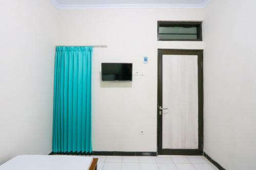 Hotel Oyo Life 3187 Kost Putri Bu Chris