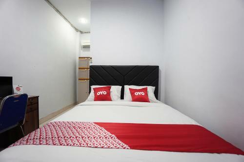 Hotel Oyo 2566 Putri Kesia Rooms