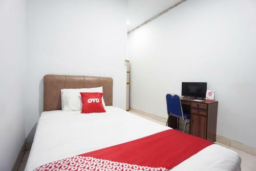 Hotel Oyo 2566 Putri Kesia Rooms