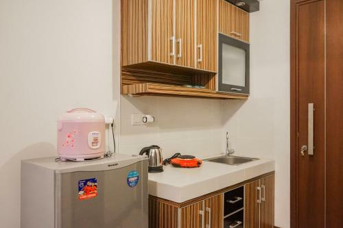 Comfy And Minimalist Studio Apartment Scientia Residence Tower B By Travelio