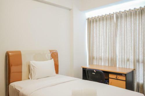 Comfy And Minimalist Studio Apartment Scientia Residence Tower B By Travelio