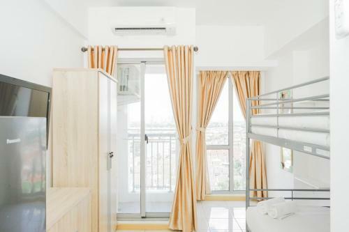 Comfort Studio Apartment M-town Residence By Travelio
