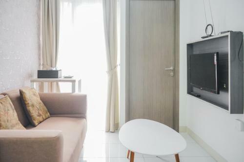 Minimalist 2br At Emerald Bintaro Apartment By Travelio