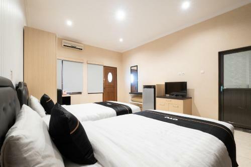 Hotel Oyo 2469 Sutomo Homestay