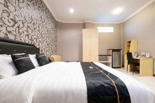 Hotel Oyo 2469 Sutomo Homestay