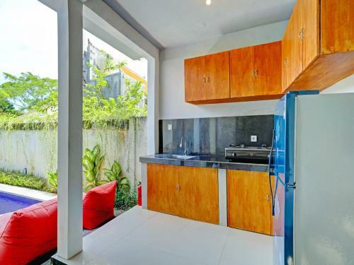 Hotel Oyo 90337 Wiguna Homestay